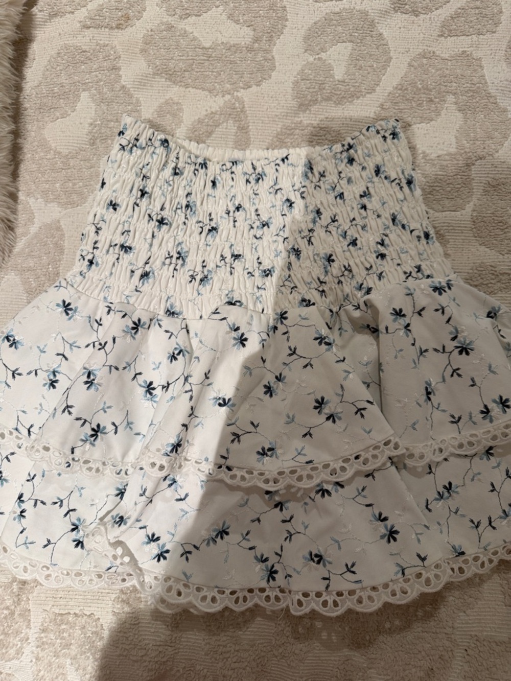 The Reset White Floral Tiered Mini Skirt with Blue Embroidery